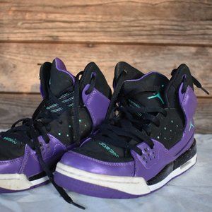 Purple Jordan high top sneakers